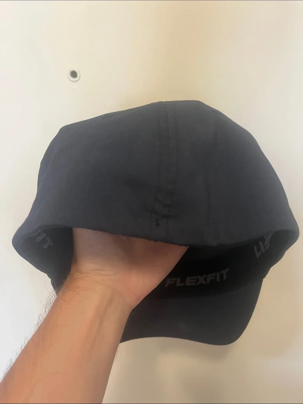 Travis Mathew Navy Blue Baseball Cap with Brown Hex Patch